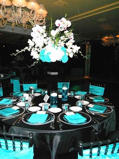 Black and Teal wedding reception @Charity Martin ...but instead of black...brown :) | Tiffany ... Teal Wedding Reception, Teal Wedding Decorations, Hall Deco, Turquoise Wedding Decorations, Wedding Peacock, Silver Wedding Decorations, 2023 Party, Black Wedding Decorations, Tiffany Blue Wedding