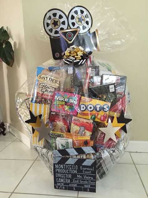 Movie Night Basket for the School Carnival Movie Theme Basket Ideas Silent Auction, Movie Theme Gift Basket Ideas, Movie Night Silent Auction Basket, Movie Theater Basket Ideas, Movie Night Theme Basket, Movie Raffle Basket, Movie Theme Basket, Movie Night Auction Basket, Movie Raffle Basket Ideas