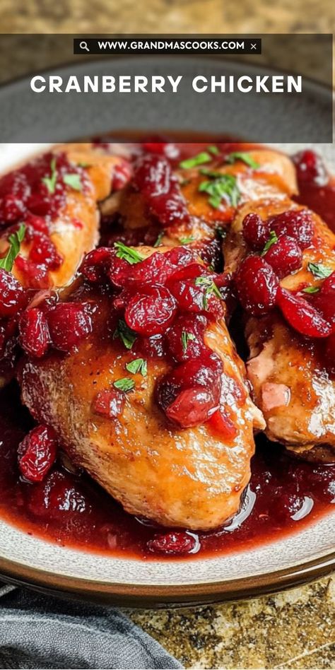 This cranberry glazed chicken is both tangy and sweet, with tender chicken baked to perfection in a delicious cranberry sauce. Great for any meal! Raspberry Vinaigrette Chicken, Maple Cranberry Chicken, Cranberry Sauce Chicken Recipes, Chicken And Cranberry Recipes, Cranberry Chicken Recipe, Chicken Christmas Recipes, Cranberry Dinner Recipes, Cranberry Chicken Baked, Cranberry Chicken Recipes