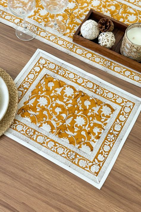 Mustard Block Printed Placemats in Floral Pattern made on 100% Pure Cotton fabric. These placemats have been painstakingly created by artisans honing the age old craft of hand block printing. We can customize our products in any color & size. Just message us with what you need and we will be happy to help. ---------- FEATURES ---------- ★ 100% Natural Cotton ★ Hand Block Printing ★ Breathable & Soft ★ Machine Washable with similar colors. Iron as required. ★ Medium weight single layered fabric used ★ Please accept minor print falls because of truly handmade processes. --------- SHIPPING --------- ★ Production Time- 5-7 days ★ Shipping Time- 4-6 days. ★ Express Shipping- Select this at the checkout for faster delivery Check out our other designs: https://www.etsy.com/ca/shop/LotusandIvoryCo Printed Placemats, Dining Table Kitchen, Printed Table Runner, Layered Fabric, Floral Table, Table Kitchen, Linen Placemats, Block Printing, Luxury Linen