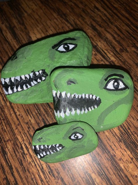 Some fun dino rocks. Check out my other art on my blog’s art page. Dinosaur Rocks Painting, Dino Painted Rocks, Dino Rock Painting, Dinosaurs Painted On Rocks, Painted Rocks Dinosaur, Dinosaur Rock Painting Ideas, Dinosaur Painted Rocks Ideas, Dinosaur Rock Painting, Dinosaur Rocks