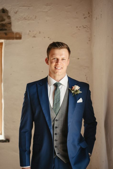 Groom in Blue Wedding Suit with Floral Buttonhole Groom Suit Ideas Blue, Best Wedding Suits For Groom, Blue Wedding Suit Groom, Blue Tweed Wedding Suits, Wedding Suits For Groom, Groom Suit Ideas, Blue Wedding Suit, Bright Blue Suit, Groom Blue Suit