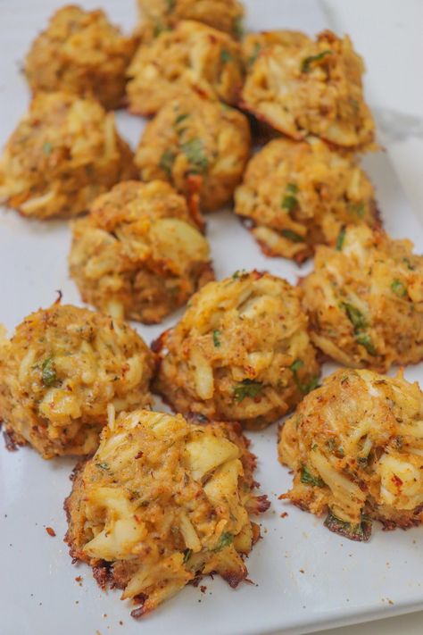 Crab+Balls:+A+Bite-Size+Delicacy+Bursting+with+Flavor Crab Balls, Lump Crab Meat, Seafood Medley, Lump Crab, Cajun Dishes, Cajun Cooking, Andouille Sausage, Fresh Seafood, Crab Meat