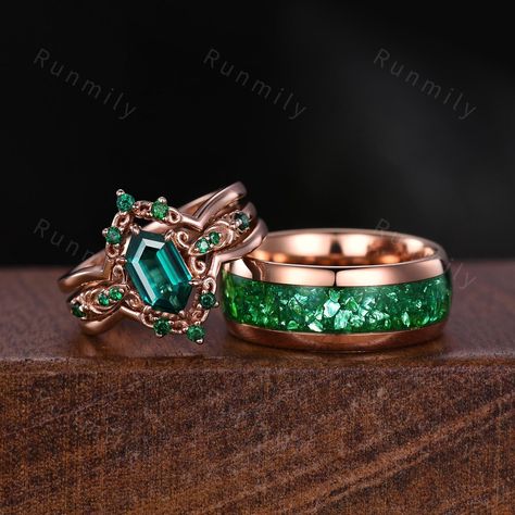 Here we have a Vintage Green Emerald Couple Ring Set Unique Double Curved Stacking Band Rose Gold His and Hers Wedding Ring Couples Emerald Promise Ring. ITEM DESCRIPTION ✦ Handmade, high-quality item! ✦ Material: Sterling Silver/Tungsten ►Sold as a two-piece set ►His ring is Rose Gold Tungsten Carbide with crushed emerald inlay. ►His band width: 8mm ►His tungsten ring will not turn green itself and will not cause your skin to turn green.  ►Her ring is Rose Gold.(can be made in white/rose/yellow Emerald Promise Ring, Rose Gold Tungsten, Couples Ring Set, Couple Ring, Stacking Bands, Wolfram, San Lorenzo, Rose Yellow, Tungsten Ring