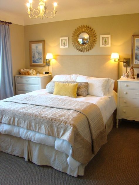 principal bedroom 1950's bungalow decorated by Cathy loveyourhomeagain.com vintage dressers and chandelier, custom burlap covered headboard, sunburst mirror over bed, sisal berber carpet Yellow Walls Bedroom Decor, Light Yellow Walls Bedroom Ideas, Bedrooms With Yellow Walls, Yellow Walled Bedroom, Neutral Yellow Bedroom, Bedroom Ideas Yellow Walls, Light Yellow Bedroom Walls, Yellow Walls Bedroom Ideas, Light Yellow Bedrooms