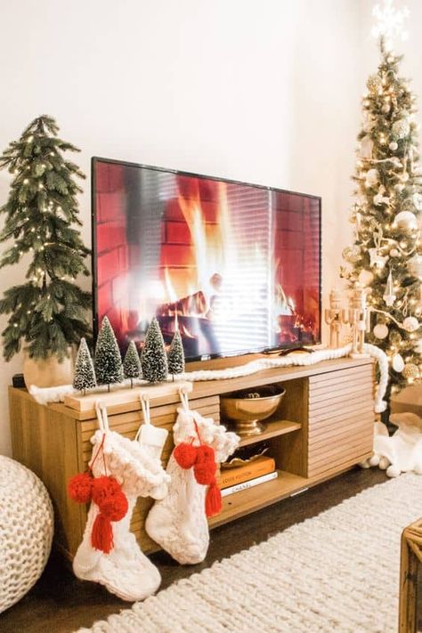 20 Christmas TV Stand Styling Ideas » Lady Decluttered Tv Stand Christmas Decor, Christmas Decorations Apartment, Apartment Christmas, Christmas Apartment, Christmas Decor Inspiration, Simple Christmas Decor, Christmas Decorations Living Room, Christmas Themes Decorations, Christmas Interiors