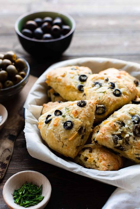 If you love olives and cheesy bread, you will love a fresh batch of Savory Olive Cheese Scones! This scone recipe is great for breakfast, with a bowl of soup or with a charcuterie board and a glass of wine! #cheese #cheesy #olives #scones #savory #cheddar #easy #recipe Scones Savory, Best Scone Recipe, Scone Recipes, Cheese Scones, Flat Breads, Savory Scones, Mini Sandwiches, Cheesy Bread, Savoury Baking