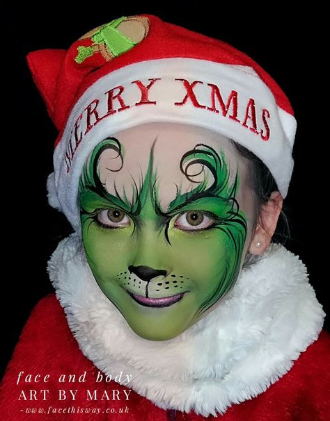 The Grinch Face painting for a boy or a girl Grinch Face Paint Easy, Grinch Face Paint Kids, Christmas Face Painting For Kids, Grinch Face Painting, Christmas Face Painting Ideas, Grinch Face Paint, Dog Face Paint, Face Painting For Kids, Face Paint Easy