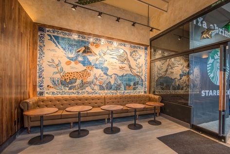 14 of the Most Breathtakingly Awesome Starbucks Stores Around the World Starbucks Interior, Starbucks Art, Starbucks Design, Starbucks Store, Wine Stand, Ceiling Murals, Starbucks Coffee, Wall Graphics, Cafe Design