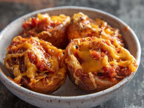 French-fried potato-skin cups are filled with smoky and sweet pulled pork and finished off with a topping of melted cheddar cheese, for a baller game-day snack. Fried Potato Skins, Sweet Pulled Pork, Stuffed Potato Skins, Potato Cups, Pulled Pork Oven, Perfect French Fries, Cheddar Recipes, Deep Fried Potatoes, Stuffed Potato