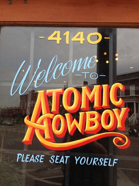 Atomic Cowboy lettering in The Grove STL Hand Painted Typography, Cowboy Typography, Painted Signage, Classic Cowgirl, Sign Painting Lettering, Cafe Exterior, Sign Fonts, Funky Fonts, Graffiti Doodles