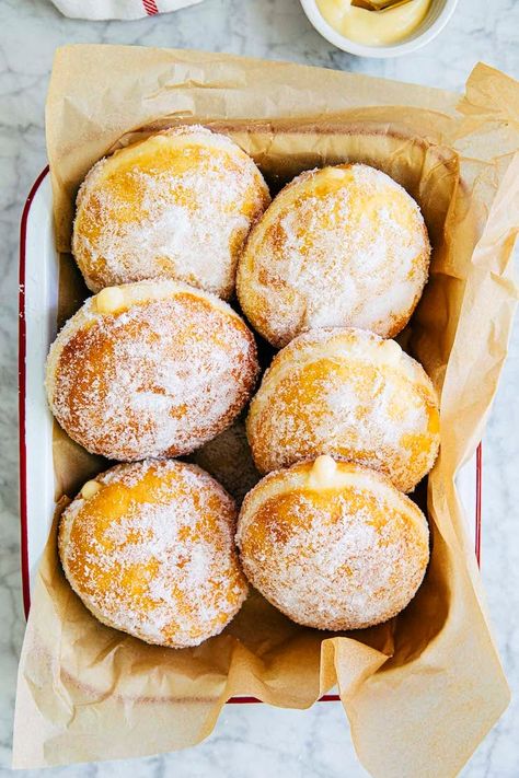 This light and fluffy malasada recipe makes a small batch of 6 authentic Hawaiian donuts inspired by Leonard's Bakery in Honolulu! The malasadas are rolled in sugar and stuffed with passion fruit pastry cream. Learn more in this post complete with tips and tricks, and FAQs. Malasadas Recipe, Breakfast Brownies, Fruit Pastries, Passion Fruit Juice, Savory Tart, Hawaiian Food, Donut Recipes, Instant Yeast, Dessert Drinks