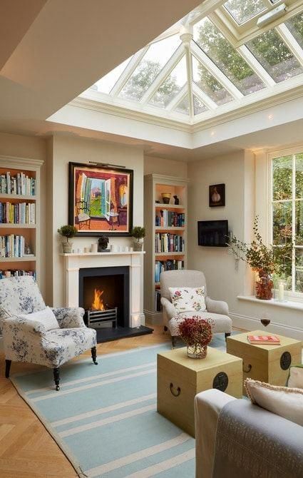 Lounge room within orangery featuring fireplace #livingroomdesigns Mid Century Interior Design, Vintage Living Room Furniture, Mid Century Interior, Interior Vintage, Home Libraries, Vintage Living Room, Design Living Room, Room Interior Design, A Living Room