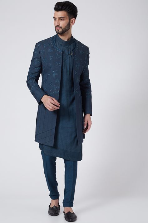 Featuring a teal blue jacket in slub silk base with pintucks and floral embroidery. It is paired with asymmetric kurta and trousers.  FIT: True to size. COMPOSITION: Slub silk. CARE: Dry clean only. Jatin Malik Couture, Jatin Malik, Asymmetric Kurta, New Address, Indian Fashion Designers, Change Of Address, Indo Western, Pernia Pop Up Shop, Embroidered Jacket