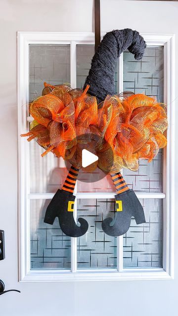 DeeDee Campbell on Instagram: "What’s up Witches?🧡🖤  Let’s make a Dollar Tree Witch Hat Wreath!  So if you saw the first which hat wreath I made, it ended up being too small for my front door so I decided to make another one.   First, I made the tip of the hat more curved, using a piece of foil and shaping it like I wanted it.  Next, I removed the tensile from the bottom area of the hat to reveal the plastic frame.   I then added some creepy cloth to the top of the hat to cover the foil and the remaining tensile.  I cut lots of strips of deco mesh (4 full rolls), twisted each grouping with a pipe cleaner, and then attached each grouping to the bottom of the hat where I removed the tinsel.  Lastly, I added the witch legs by attaching them to the back of the hat, and then hung it on my doo Dollar Tree Witch Hat Wreath, Dollar Tree Witch Hat, Halloween Witch Hat Wreath, Which Hat, Witch Hat Wreath, Hat Wreath, Witch Legs, Witch Wreath, Halloween Witch Hat