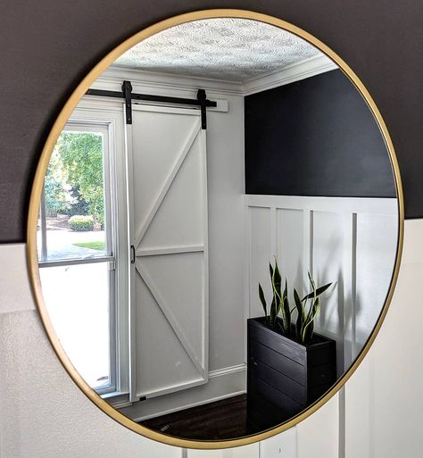 Round gold mirror on board and batten wall Entryway Black And White, White Board And Batten Wall, Black And White Board, White Board And Batten, Making Barn Doors, Sliding Barn Door Track, Installing Shiplap, Batten Wall, Round Gold Mirror