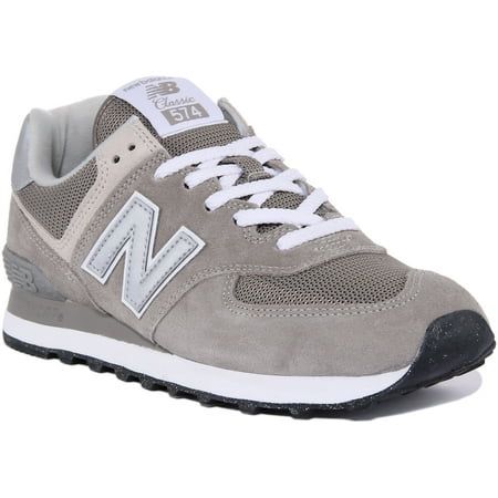 New Balance 574 is an all time classic. The premium suede and breathable mesh upper has a retro-meets-modern design to create a look that's as stylish as it is easy to wear. Built for comfort as much as style, these lace up fashion sneakers have an ENCAP midsole and lightweight EVA cushioning to provide underfoot support and comfort. Built with a durable rubber outsole, this classic lace up shoe is made to last. Size: 060.  Color: Gray.  Gender: female.  Age Group: adult. Grey Shoes Women, Gray Shoes Women, Air Shoes, Nike Air Shoes, Casual Dress Shoes, New Balance 574, Walking Shoes Women, New Balance Women, Canvas Shoes Women