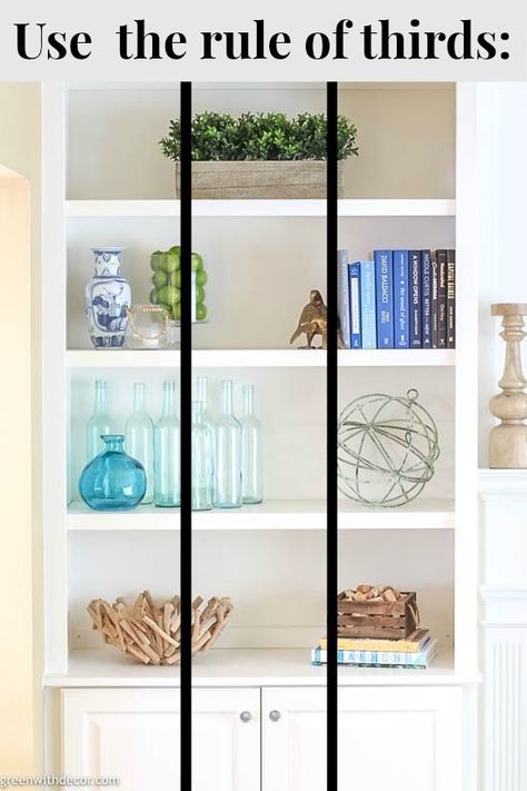 Wow, these bookshelves are GORGEOUS!! This post walks through how to decorate bookshelves from start to finish and has plenty of bookshelf decorating ideas if you're stuck! This rule of thirds is a game changer and makes decorating bookshelves SO much easier! If you're stumped on how to decorate a bookshelf, click through for the easy step by step guide for great looking bookshelves! #greenwithdecor #bookshelfdecorating #decoratingbookshelves #decorating #coastalstyle How To Decorate Bookshelves, Decorate Bookshelves, Bookshelf Decorating Ideas, How To Decorate A Bookshelf, Remodel Entryway, Styling Bookshelves, Shelf Decor Living Room, Styling Shelves, Decorating Bookshelves