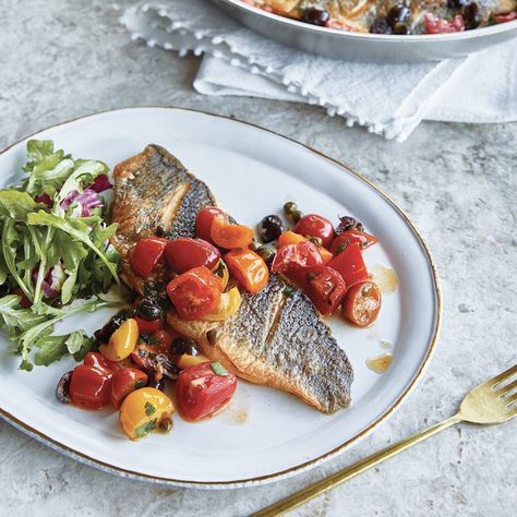 Giada De Laurentiis' pan-seared branzino with tomato and capers Branzino Recipe Filet, Pan Seared Fish, Branzino Recipe, Giada Recipes, Seared Fish, Orange Baking, Olive Recipes, Food Inc, Eating Light