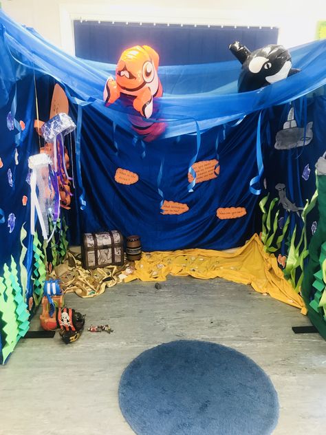 Under the sea role-play area Rainbow Fish Role Play Area, Under The Sea Role Play Area, Beach Role Play Eyfs, Under The Sea Role Play, Under The Sea Dramatic Play, Ocean Dramatic Play, Under The Sea Display, Under The Sea Eyfs, Role Play Areas Eyfs