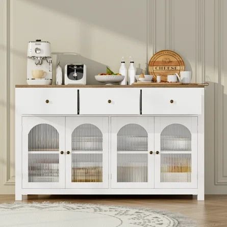 Wade Logan® Bonnetta 55.1"W 3 Drawer Sideboard Buffet, Modern Sideboard with Glass Doors - Wayfair Canada Sideboard With Glass Doors, Kitchen Cabinet Display, Wood Coffee Bar, Lower Cabinets, White Buffet, Cabinet Display, Wood Buffet, Farmhouse Kitchen Cabinets, Fluted Glass