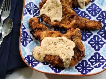 Fried Pork Chops with Homemade Table Gravy Recipe | Kardea Brown | Food Network Delicious Miss Brown, Southern Fried Pork Chops, Kardea Brown, Homemade Table, Pork Entrees, Brown Food, Brown Recipe, Fried Pork Chops, Homemade Tables