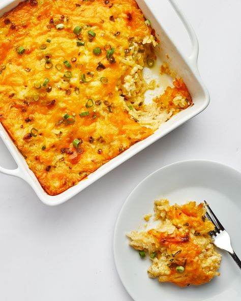 Pitmaster Matt Horn shares his grandmother's cheesy potato casserole recipe with us. Stuffed with hash browns, lots of cheddar cheese, and green onions, you'll definitely want to make this. Cheesy Hashbrown Bake, Cheesy Potatoes With Hashbrowns, Cream Of Potato Soup, Cheesy Hashbrowns, Cheesy Potato Casserole, Hash Brown Casserole, Hash Brown, Hash Browns, Cheesy Potatoes