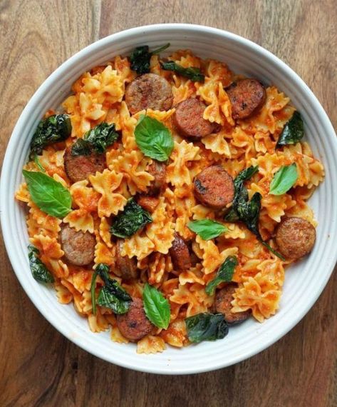 This Farfalle with Vodka Sauce, Sausage, Spinach, and Basil recipe is perfect to make during the weekdays for dinner. This pasta uses our Hot or Sweet Italian Sausage, farfalle, olive oil, vodka sauce, spinach, and basil. Grab the full recipe to add the ingredients to your weekly grocery list! #PastaDinnerRecipes #DinnerRecipes #SausageDinnerRecipes #ItalianSausageDinnerRecipes #SausagePasta #ItalianSausagePasta Farfalle Pasta Recipes, Farfalle Recipes, Fun Pasta, Vodka Sauce Pasta, Sausage Recipes For Dinner, Sausage Spinach, Sausage Pasta Recipes, Delicious Family Dinners, Italian Sausage Pasta