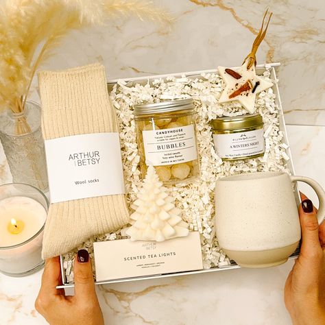 ✨ Introducing: A Winter’s Night ✨ Our latest luxury gift box is here to elevate your cozy evenings in. With a palette of soft winter whites, it’s filled with everything you need for an indulgent night of relaxation and style. Think elegant candles, cosy wool socks, a chic stone mug, and a touch of sparkle with champagne sweets. This gift box is the perfect treat for the stylish woman who deserves a moment of calm this winter. Surprise someone special with the ultimate cozy night in 🤍 Night Luxury, Winter Whites, Gifts Photography, Elegant Candles, Winter Gifts, Soft Winter, Cozy Night, Winter Gift, Luxury Gift Box