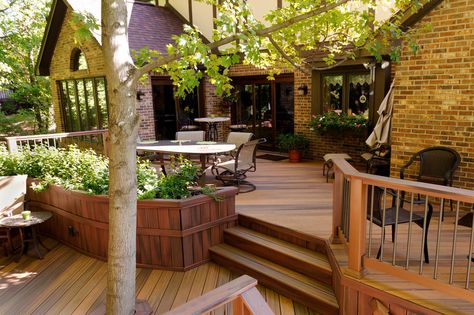 Raleigh Multi-Level Decking: More Than Just a Beautiful Deck | Archadeck Outdoor Living Deck Railing Planters, Multi Level Deck, Patio Installation, Laying Decking, Dream Deck, Deck Builders, House Deck, Custom Decks, Tudor House