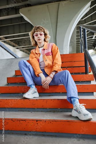 Stock Image: Vertical portrait of young carefree woman wearing colorful street style fashion outdoors in urban setting Streetwear Photoshoot Ideas, Colorful Street Style, Streetwear Photoshoot, Men Fashion Photoshoot, Urban Fashion Photography, Style Pictures, Hip Hop Style, Urban Street Style, Photoshoot Concept