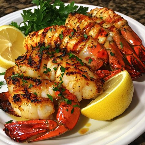 🦞🔥 Treat yourself to Grilled Lobster and Shrimp—a perfect blend of smoky and succulent seafood for your next feast! 🔥🦞 #GrilledSeafood #LobsterLovers Grilled Lobster and Shrimp Ingredients: Lobster tails (4, split in half) Large shrimp (1 lb, peeled and deveined) Olive oil (2 tbsp) Lemon juice (2 tbsp) Garlic, minced (3 cloves) Paprika (1 tsp) Salt and pepper (to taste) Fresh parsley (for garnish) Instructions: Preheat grill to medium-high heat. Mix olive oil, lemon juice, garlic, paprika... Seafood Kabobs, Lobster And Shrimp, Classy Food, Lobster Recipes Tail, Grilled Lobster, Lobster Tail, Large Shrimp, Lobster Tails, Food Babe