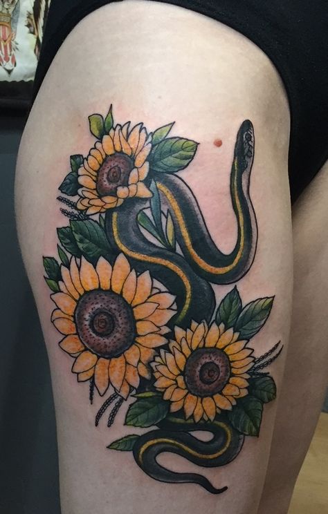 Garter Snake and Sunflower thigh/hip tattoo by Adam LoRusso at Redemption Tattoo in Cambridge, MA This tattoo is my Slytherine, Hufflepuff (slytherpuff) inspired design. Diamond Heart Tattoo, Small Feather Tattoo, Sunflower Tattoo Thigh, Sunflower Tattoo Simple, Flower Tattoo On Ribs, Sunflowers Art, Tattoo Hip, Sunflower Tattoo Sleeve, Sunflower Tattoo Shoulder