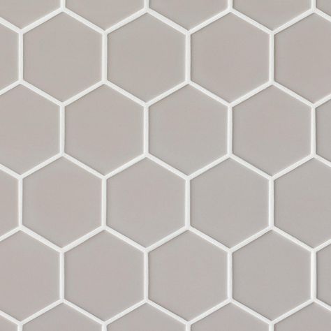 Personalize your space with the 12 x 12 Cashmere 3 in. Hexagon Matte Porcelain Mosaic. This gray matte finish tile will make a great impact in small areas like the bathroom, den, or other overlooked spaces. Porcelain tile is stylish and easy to install, and it can go indoor or outdoor areas. It can also be easily cleaned and maintained in any space. This tile will add beautiful details to the design of your space. With Cashmere 3 in. Hexagon Matte Porcelain Mosaic, you can choose to be subtle or Tile Spacers, Tile Cleaners, Grey Tiles, Porcelain Mosaic, Tile Installation, Mosaic Designs, Wet Rooms, Fireplace Surrounds, Shower Floor