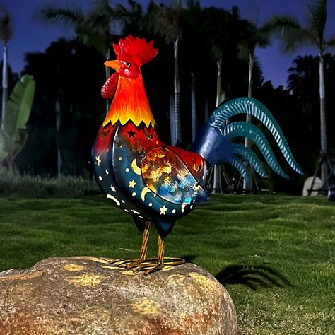 PRICES MAY VARY. 【Rooster Statue】-- This Rooster Decor handcrafted from durable metal and premium glass materials with gorgeous metallic multi-colorful finishing painted by hand, which makes it more realistic, add a graceful and vivid touch to any outdoor scene or room. 【Solar Rooster With Led Lights】-- The Metal Solar Rooster Yard Art can automatically absorb solar energy to charge itself during the day, automatically turn it on during the dark. At night, the light will be emit a unique moon an Chicken Yard, Rooster Garden, Patio Art, Rooster Statue, Metal Rooster, Landscape Products, Rooster Decor, Chicken Decor, Outdoor Living Decor