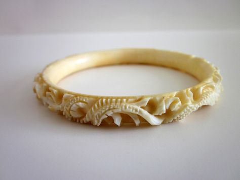 ivory bangles made from elephant tusk in rajasthan Elephant Teeth, Ivory Bangles, Elephant Tusk, Ivory Jewelry, Chinese Lacquer, Hand Printed Textiles, Elephant Bracelet, Bangles Making, Metal Crafts