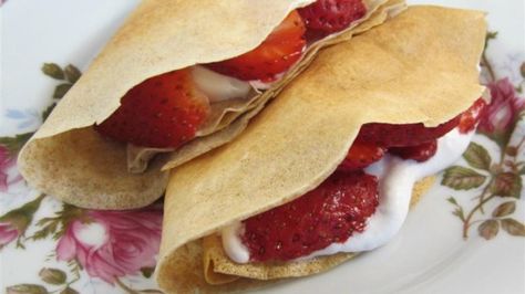 Berries provide the filling for these simple crepes using whole wheat flour, egg whites, and skim milk. Crepe Suzette, Crepes Recipe, Savory Crepes, Crepe Recipes, Skim Milk, Egg White, Frozen Fruit, Frozen Blueberries, Frozen Strawberries