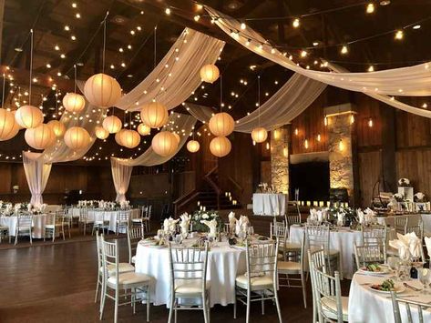 Rustic Hall Wedding Decor, Wedding High Ceiling Decor, Wedding Decorations Lanterns, Wedding Venue With Fireplace, Wedding In A Gymnasium, Wedding Reception Lanterns, Vintage Wedding Venues Rustic, High Ceiling Wedding Decor, Wedding Inside Decorations