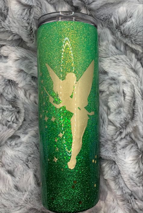 Glitter Tumbler Ideas Disney, Tinkerbell Tumbler Cups, Disney Epoxy Tumblers, Tinkerbell Tumbler Ideas, Disney Epoxy Tumbler, Disney Glitter Tumbler, Disney Tumbler Ideas, Disney Tumbler Cups, Tinkerbell Tumbler