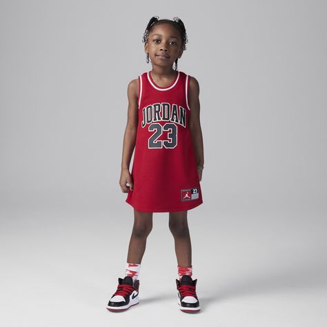 Put your little baller-to-be in this play dress, designed in the style of a basketball jersey. It's made of breathable mesh fabric in a roomy A-line cut that can be layered over bike shorts or leggings for extra coverage. Dress With Dunks, Jordan 23 Jersey, Kid Dress, Lifestyle Dresses, Jordan 23, Basketball Girls, A Basketball, Play Dress, Dresses Kids Girl