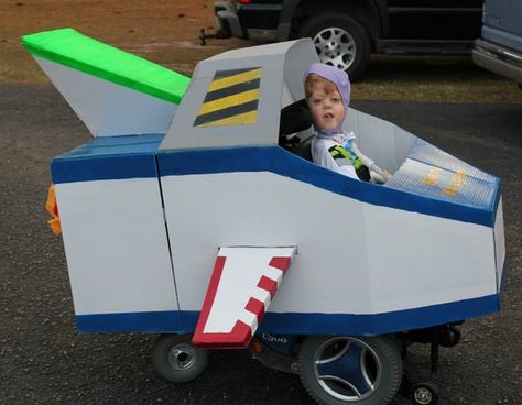 100 Halloween Costumes that will make you LOVE LIFE! | 3E Love's Wheelchair Heart Tractor Costume, Buzz Lightyear Halloween Costume, Wheelchair Costumes, Trash Truck, Thanksgiving Parade, Homemade Costume, John Deere Tractor, Farm Photo, Family Halloween Costumes