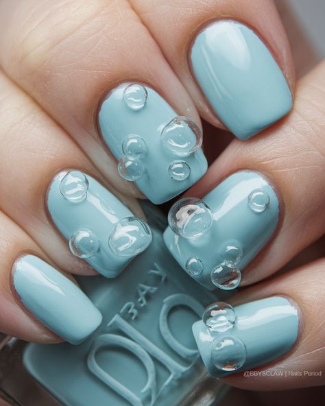 🌈✨ Dive into a dreamy world of pastel blue bubble-inspired nail art! Each stroke is a playful nod to the light, airy essence of bubbles, transforming your fingertips into a canvas of whimsical elegance. Let your nails float free with creativity! 💙💅 #BubbleNails #DreamyDesigns #NailArtMagic Bubbles Nails Designs, Bubble Nail Art Design, Nails With Bubbles Design, Soap Bubble Nail Art, 3d Bubble Nail Art, Pastel Blue Nails, Bubble Nails, Pastel Nails Designs, Pastel Nail