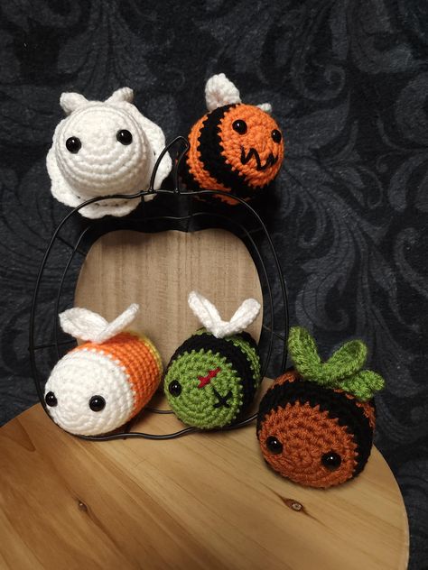 These adorable little bees are inspired by all the classic Halloween tropes. They would make a perfect little pocket pal for kids, or cute decorations for the spooky season! Each bee is handmade by me using 100% acrylic yarn. I do use safety eyes on these items, and while I take the extra step of gluing the washers on I still do not recommend giving them to babies. Like spooky bees? Check out some more I make here: Not your cup of tea? Maybe something else will intrigue you here: Crochet Halloween Patterns Free, Crochet Pour Halloween, Disney Crochet Patterns, Pinterest Diy Crafts, Easy Crochet Animals, Fall Crochet Patterns, Confection Au Crochet, Halloween Crochet Patterns, Crochet Diy