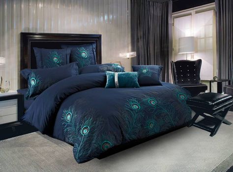 Peacock Feather by Seasontex is one of the most popular bedding patterns that we offer, and it is no wonder why. The rich blue background is embroidered with amazingly detailed peacock feathers in shades of silver and jade that seem to float. The embroidery is perfectly positioned from the foot of the bed and also on the pillow sham(s). These 100 percent cotton 300 thread count bedding sets include the fitted sheet, pillow sham (s), pillow case (s) and decorative pillow cover. Available in si... Navy Blue Duvet Cover, Peacock Bedroom, Peacock Bedding, Blue Comforter Sets, Blue Comforter, Peacock Decor, Blue Duvet, Blue Duvet Cover, Luxury Bedding Sets