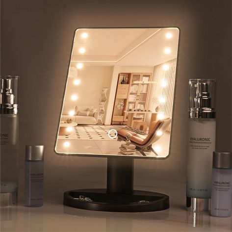 Enjoy flawless makeup application with bright LED lights, ensuring a well-lit view while you are getting ready. Apply cosmetics, style hair or put on jewellery with even illumination. With its sleek and lightweight design, this make up mirror with lighting is ideal at home or on the go. It's powered by 4 AA batteries (not included) so there are no cumbersome wires or charging cables to worry about Light Up Vanity Mirror, Mirror For Dressing Table, Light Up Vanity, Bathroom Desk, Table Bathroom, Table Makeup, Face Mirrors, Battery Powered Light, Led Makeup Mirror