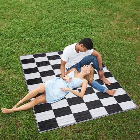 Corrigan Studio® Haylee Checkered Black/White Indoor / Outdoor Area Rug & Reviews | Wayfair Straw Rug, Rug Checkered, White Rectangle, Rug Stain, Sun Rays, Plastic Straw, Outdoor Area Rug, Indoor Outdoor Area Rugs, Outdoor Area Rugs