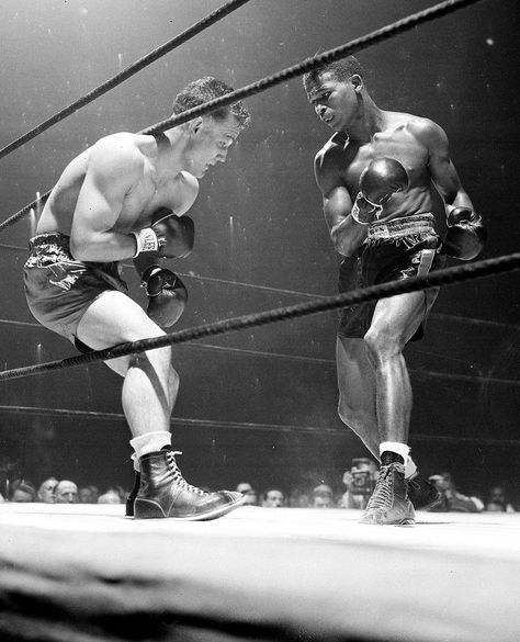 SUGAR RAY ROBINSON⁠ By @pz.1972⁠ Part 1:⁠ ⁠ Walker Smith Jr. Sound familiar? Probably not. The metamorphosis to ‘Sugar Ray Robinson’ took some time to come to fruition, but when it did, it changed the landscape of boxing folklore forever.⁠ ⁠ Born on 3 May 1921, in Ailey, Georgia to Leila Hurst and Walter Smith Sr, Robinson was one of three siblings and the only son. His father picked peanuts and cotton, and also farmed corn, whilst juggling any other work he could, including construction. ⁠ ⁠... Rocky Balboa And Apollo Creed, Sugar Ray Robinson, Robbie Robinson Bodybuilder, Famous Boxing Photos, Muhammad Ali Boxing, Joe Louis, Bare Knuckle, Boxing Images, Boxing History