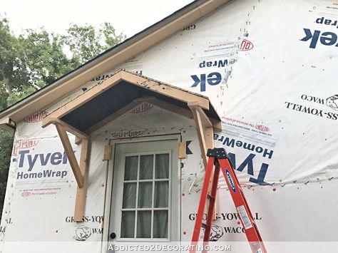 Diy Portico Entry, Diy Portico, Entry Overhang, Portico Entry, Garage Setup, Front Porch Stairs, Front Door Overhang, Storage Barn, Door Overhang