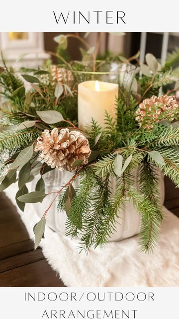 38K views · 2.9K likes | Janine Graff on Instagram: "Winter Holiday Indoor/Outdoor Planter ❄️🌲is a natural and timeless arrangement perfect for a stunning holiday centerpiece, thoughtful gift, or winter decor in your home! Do you like to make simple arrangements using fresh cut greens? To shop, comment the word LINK and I’ll message you same and similar details. I used a large frost-resistant ceramic planter, filled it with fresh greens from my yard and the store, added garden stones in a glass vessel, and placed an outdoor flameless candle on top. Completed the look with gold pinecones, but you can customize with natural pinecones, berries or ornaments as you prefer. #winterdecor #simplewintergreens #holidaygreens #wintercenterpiece #winterstyling #holidaydecor" Vases With Christmas Greenery, Live Evergreen Centerpieces, Fresh Evergreen Centerpieces, Holiday Evergreen Arrangement, Candles And Winter Greenery Centerpiece, Winter Arrangements, Winter Centerpieces, Madison Wedding, Indoor Outdoor Planter