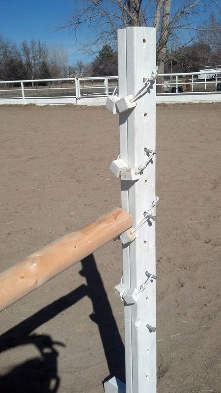 Home Made Jump Cups.  Carriage bolt, wood blocks, rope.  Super cheap and easy! Homemade Jumps Horses, Diy Jump Standards, Homemade Horse Jumps, Easy Horse Stalls, Horse Jumping Exercises, Cross Country Jumps, Horse Jumps, Horse Arena, Diy Horse